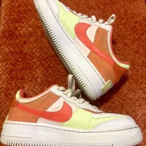 Vibrant Women's Sneakers with Orange and Cream Accents